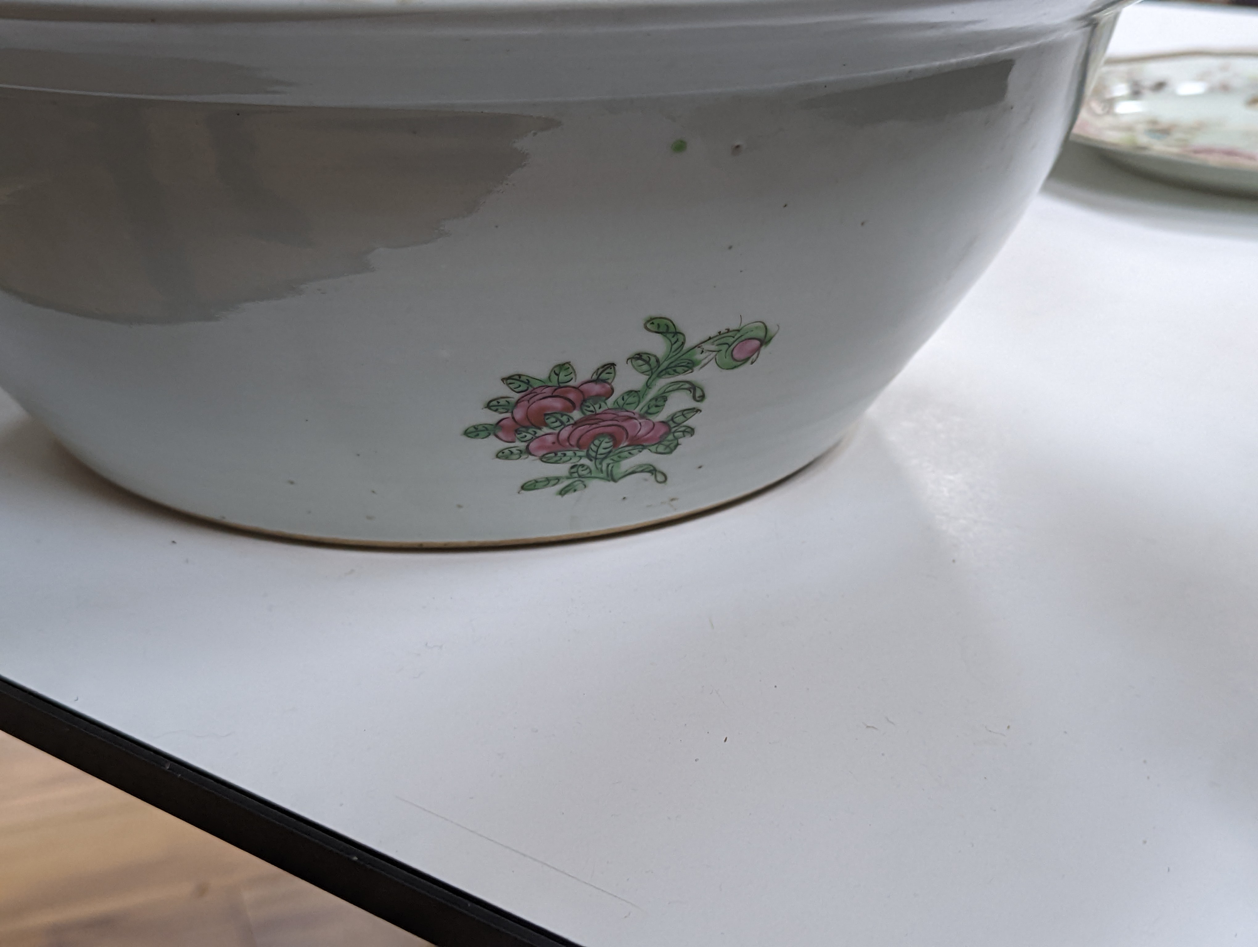 A 19th century Chinese famille rose water bottle with cover and basin, water bottle and cover 39 cms high.